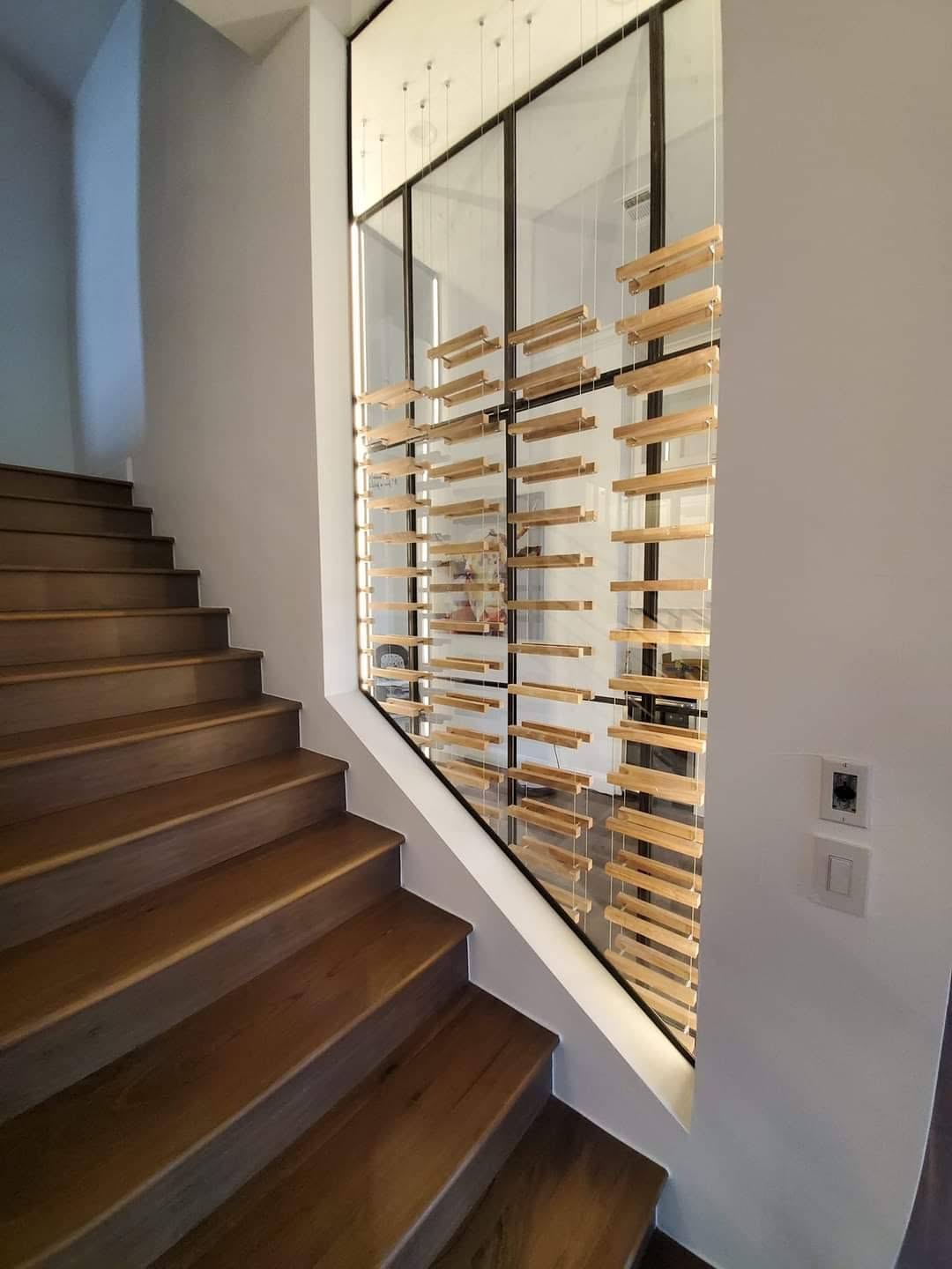 Custom wine wall & staircase feature